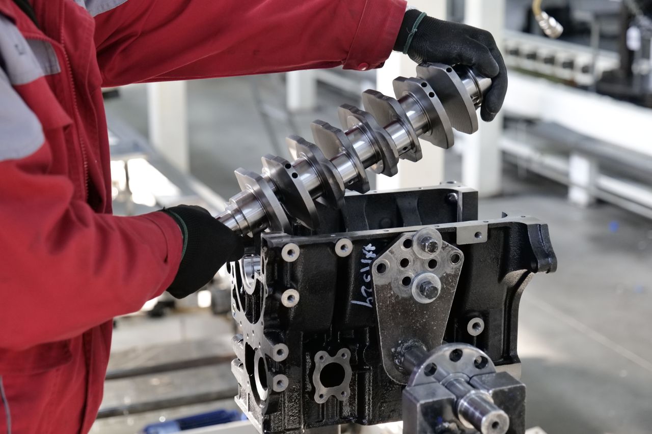 Mechanic rebuilding a diesel engine in Toronto and Ontario